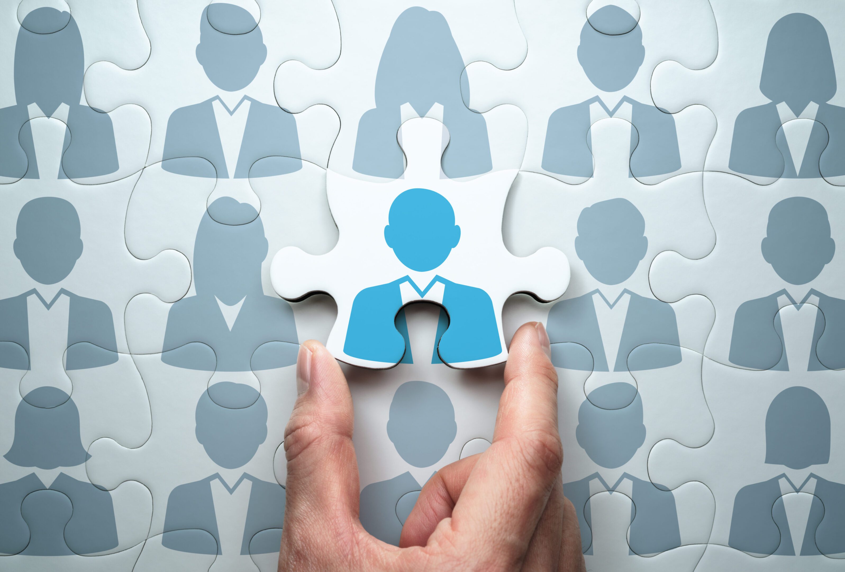 Selecting person and building team. Business people relationship concept. Connecting last jigsaw puzzle piece.